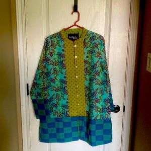 Multi color jacket/shirt. Never worn.